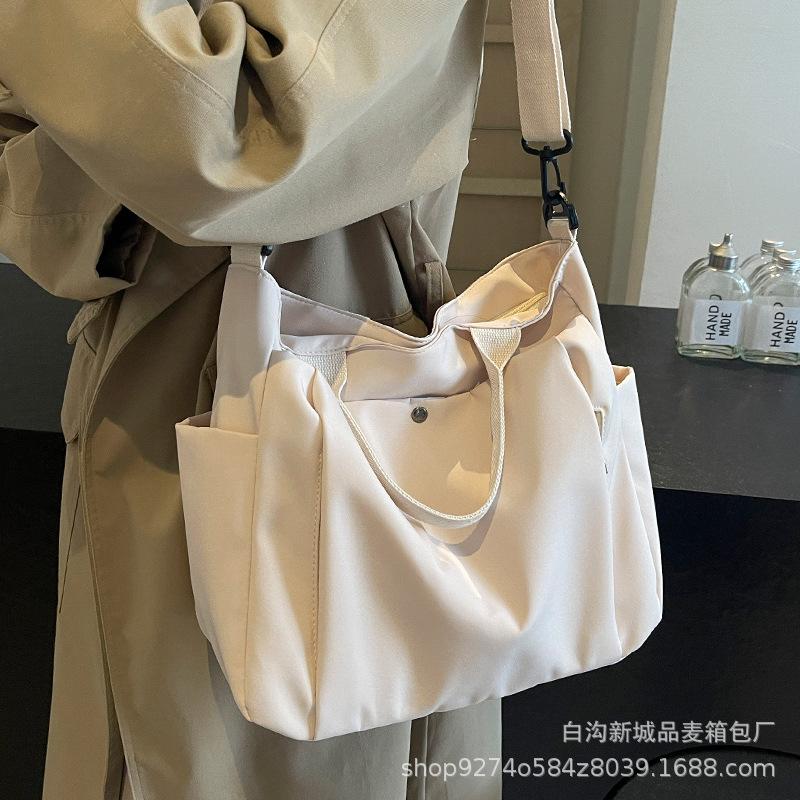 Large capacity canvas bag women's 2025 autumn and winter new casual shoulder bag simple class commuter messenger tote bag