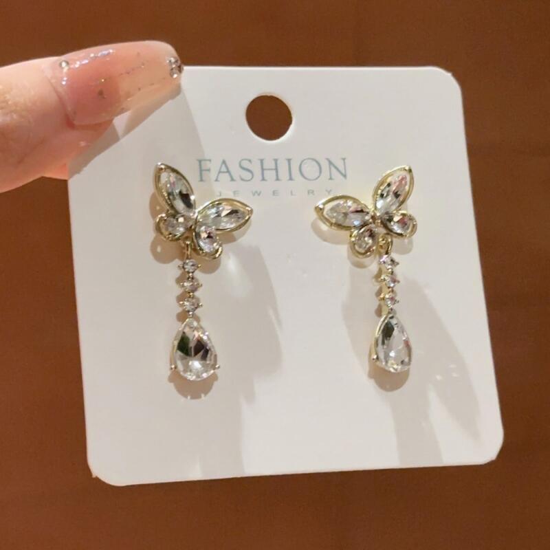 Boucles d'oreilles pendantes Zircon Nœud Papillon Exquis Luxe Léger pour Femme Fille Doux Mignon Boucles d'oreilles pendantes Goutte d'eau Bijoux de Fête Vente en Gros