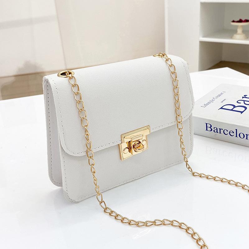 Women's bag lid type personalized lock small square bag autumn and winter new oblique span change small bag