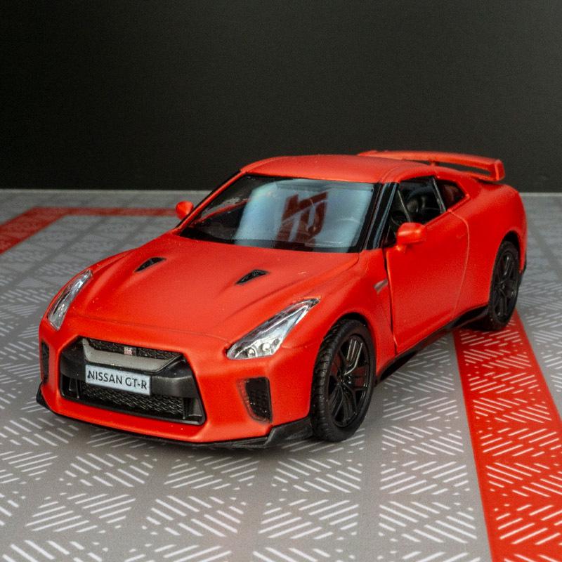 

Имитация литого игрушечного автомобиля Nissan GTR R35 со звуком, светом и инерционным механизмом, открывающиеся двойные двери
