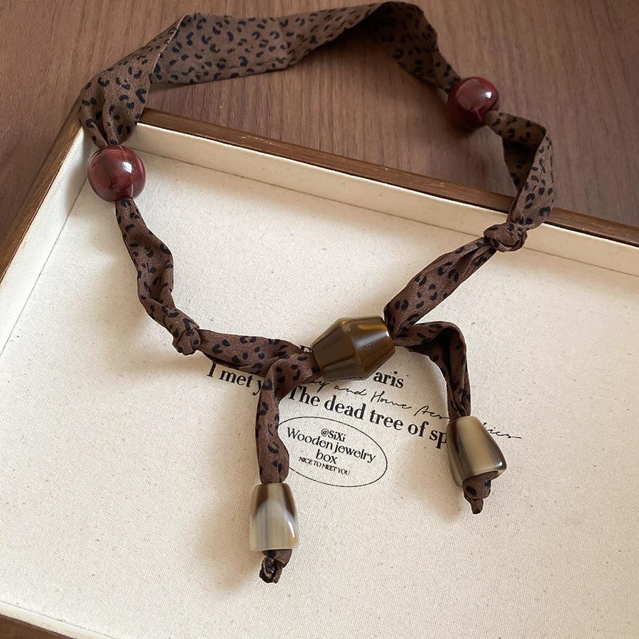 Retro style coffee fabric acrylic love necklace light luxury sweater chain versatile necklace women