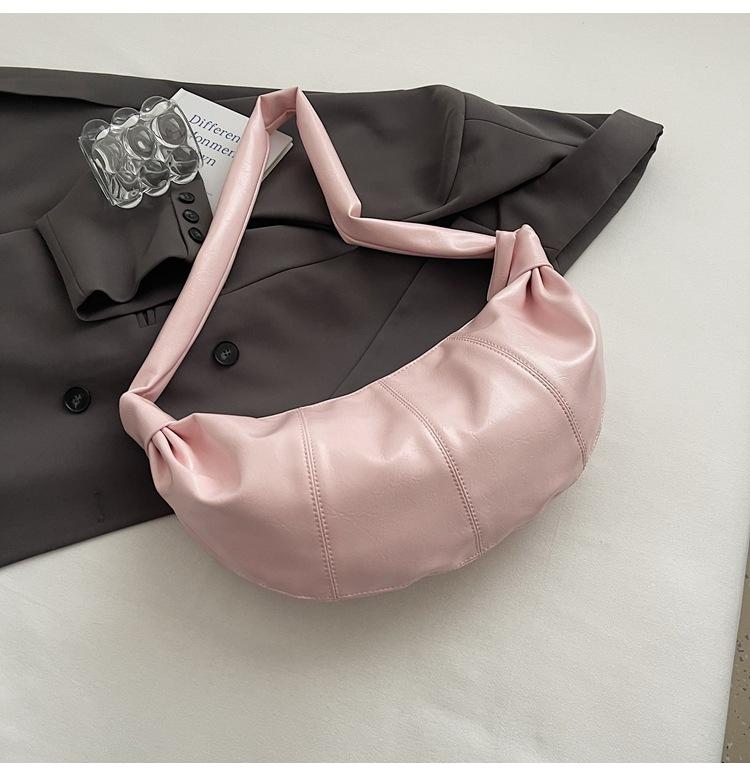 

Retro pleated dumpling bag 2025 new large capacity knotted shoulder strap single shoulder messenger bag PU face women s bag розовый