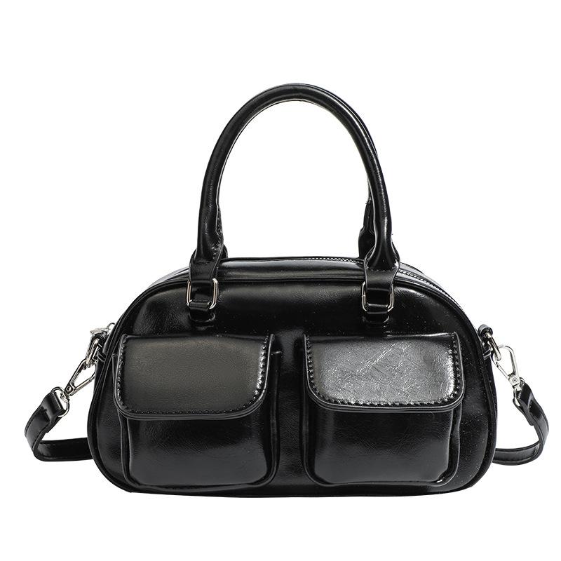 Korean version of trendy niche design underarm baguette bag women's 2025 autumn new shoulder Boston bag bowling bag