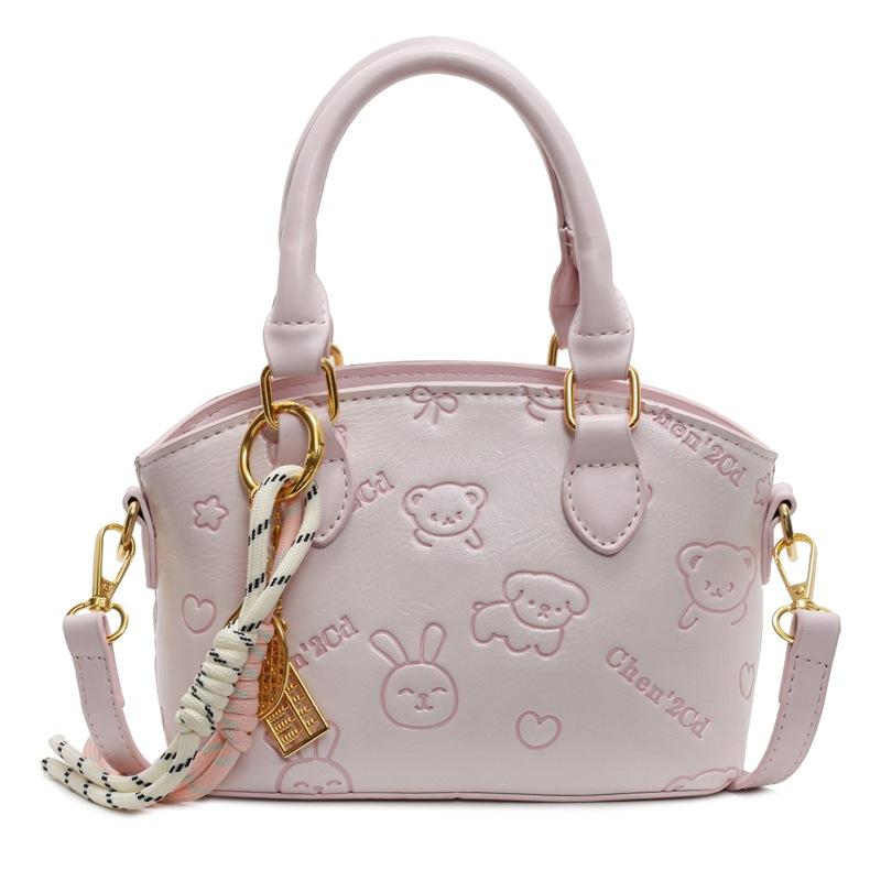 Korean Version of the New Casual Temperament Cute Embossed Portable Bucket Bag High-end Commuter Niche Design Messenger Bag Women