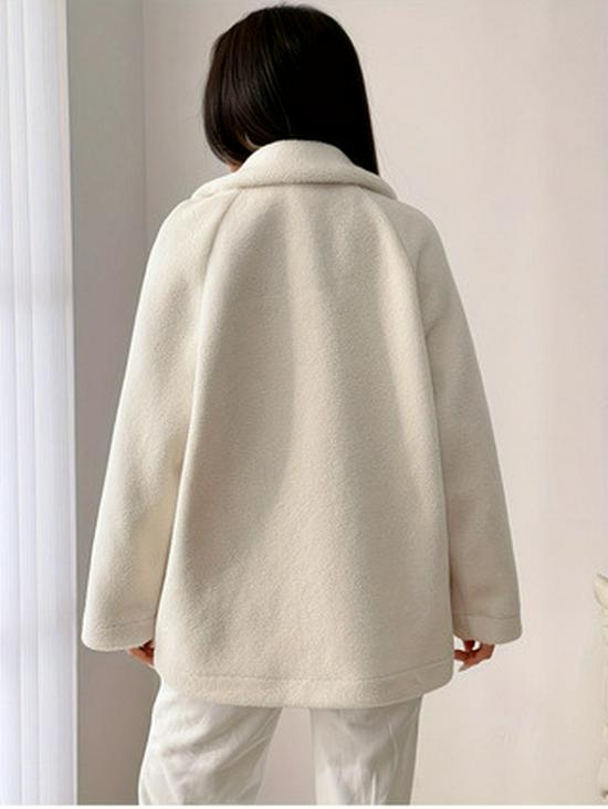 Evropský a americký kabát s volným teplým límcem na podzim/zimu