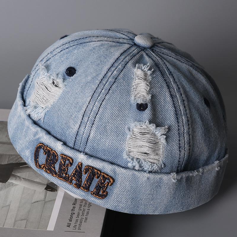Europäische und amerikanische Stickbuchstaben zerrissene Jeans Melonenmütze Herren und Damen Paare Modetrend lässig vielseitig Vermieterhut