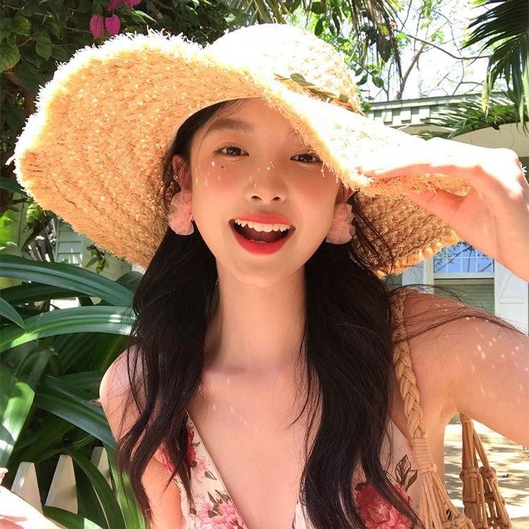 Flower woven Lafite straw hat women's summer French large brim travel sunshade sunscreen hat seaside vacation sun hat