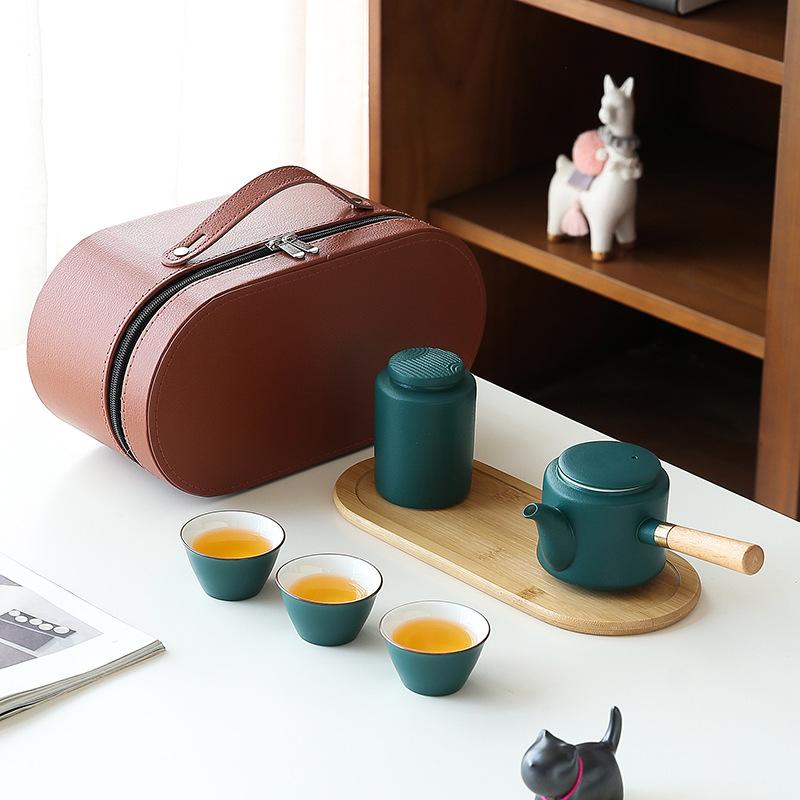 

Coarse pottery side handle pot, one pot, three cups of travel tea set, creative and portable outdoor Kung Fu tea set, Mid-Autumn Festival souvenir