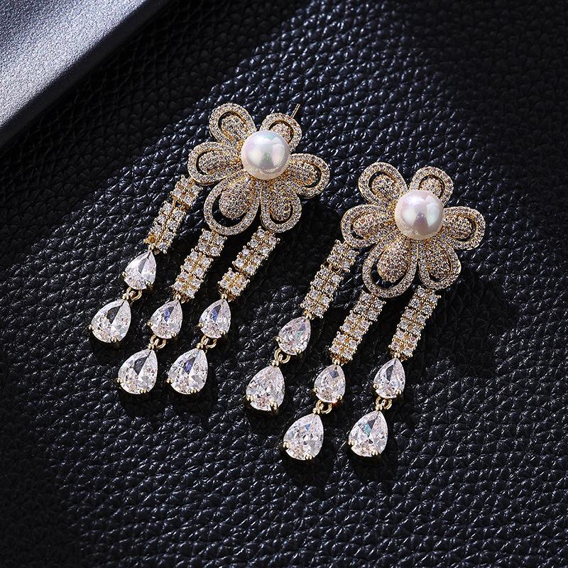 

Gold-Plated Bowknot Earrings with Red Corundum