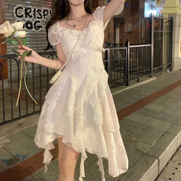 French temperament first love white dress women's summer new waist and thin pure desire ruffle edge irregular skirt