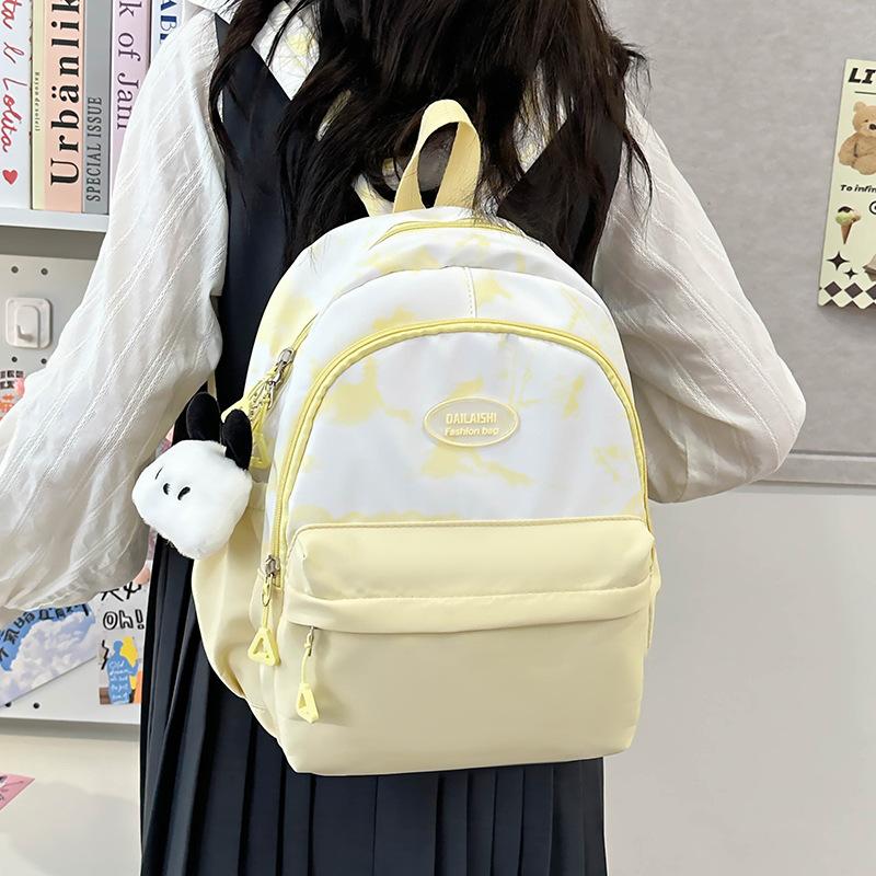 Solid color schoolbag for female junior high school students, high-value college style backpack for students, ink painting versatile backpack