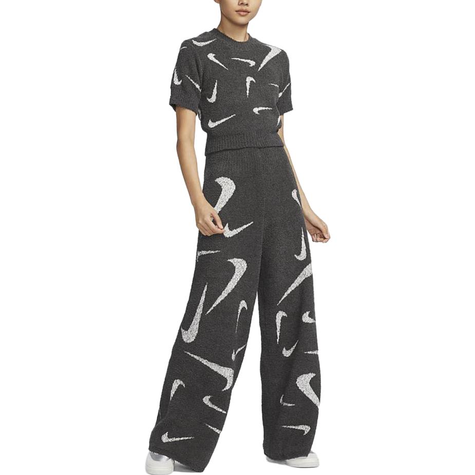 Nike Abbigliamento sportivo Phoenix Cozy Bouclé Stampa All-Over Pantaloni casual in maglia a gamba larga a vita alta Pantaloni da donna Grigio medio FD4289-254