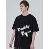 Daddy To Be T Shirt Black Baby Footprints and Text Graphic Design for Expecting Fathers Pregnancy Announcement Party Gift