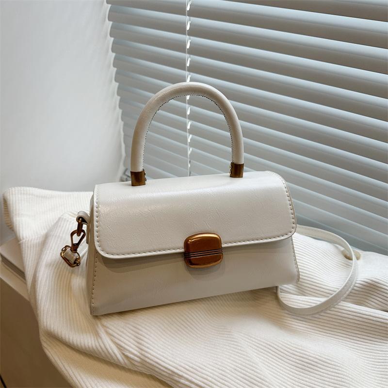 

Niche new retro fashion high-end texture solid color handbag temperament one-shoulder crossbody bag trendy commuting белый