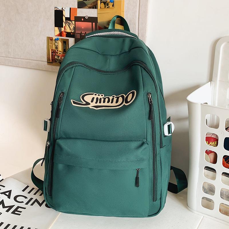 School bag Elementary school student Junior high school student High school student College student Female large capacity burgundy men's backpack