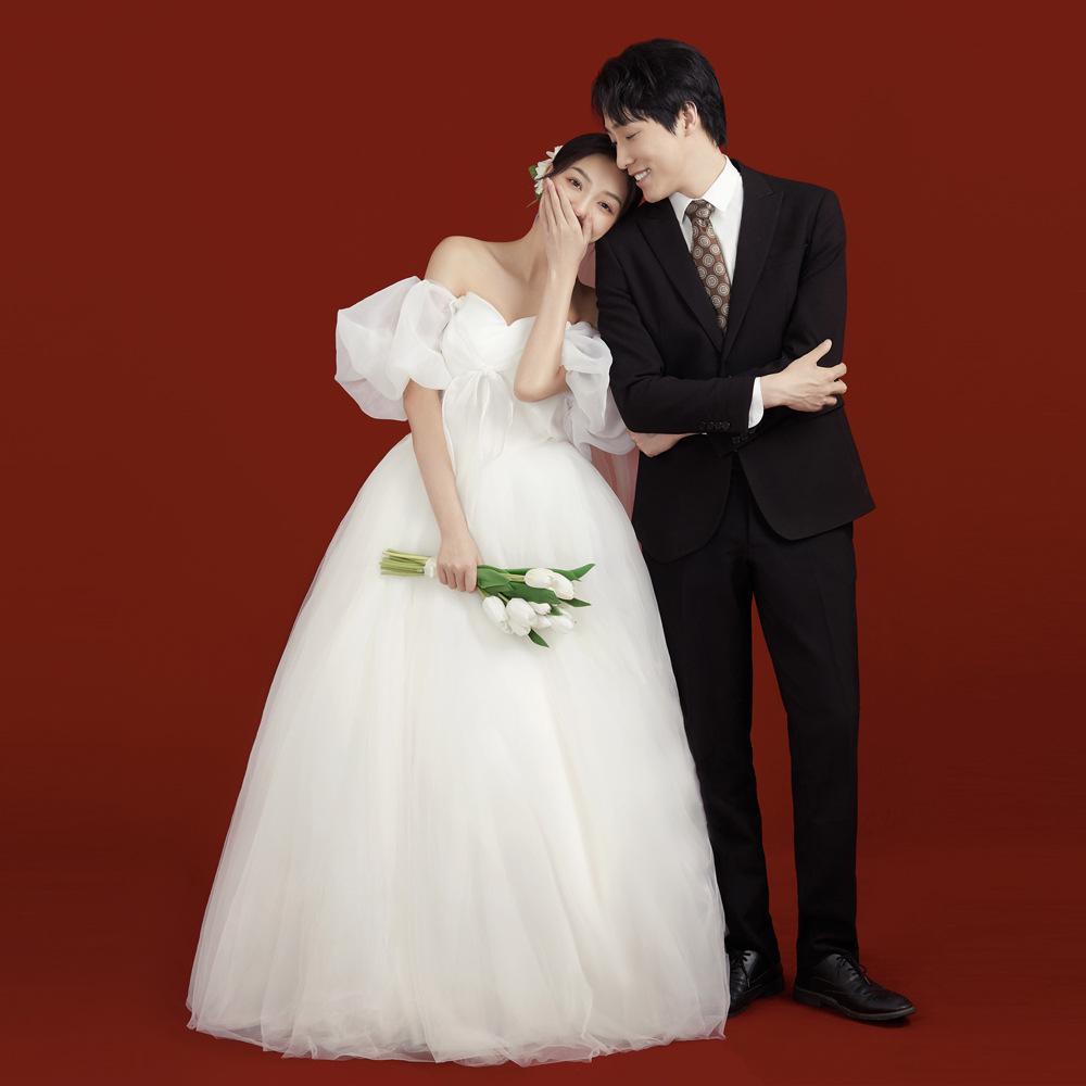 2026 One-Shoulder Wedding Dress with Bow: Slimming Puffy Skirt & Puff Sleeves, Floor-Length Princess Fairy Look for Travel Photos and Events.