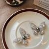 Luxury Shi Family Pearl Butterfly Brooch: High-End Corsage Pin for Autumn/Winter Sweaters & Small Xiang Style Coats