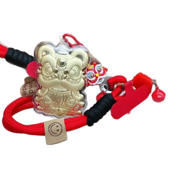 Goldener Löwentanz-Anhänger mit 20 mg Gold - Schlüsselanhänger und Handykette im Nationalen Trend als Geschenk.