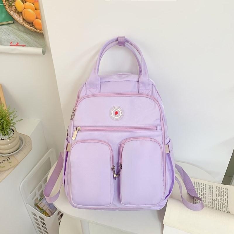 

Школьный рюкзак 2025 новый большой вместимости многосекционный рюкзак для ученика средней школы корейская версия универсальный рюкзак повседневный простой школьный рюкзак фиолетовый