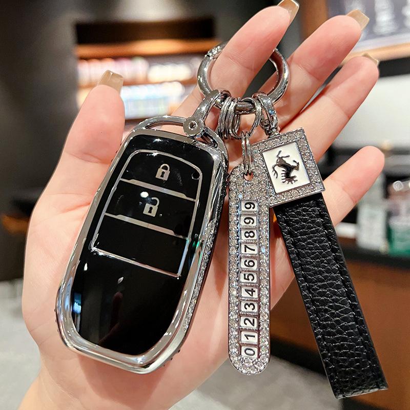 Applicable à la housse de clé Toyota Fenglanda Corolla Ruifang Lingfang 2023 Wesa Kuluze bz3 boucle de sac de voiture