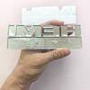 Large metal stickers 14.3 cm HE 5.7 LITRES suitable for decorative sticker accessories for the rear of the car trunk.