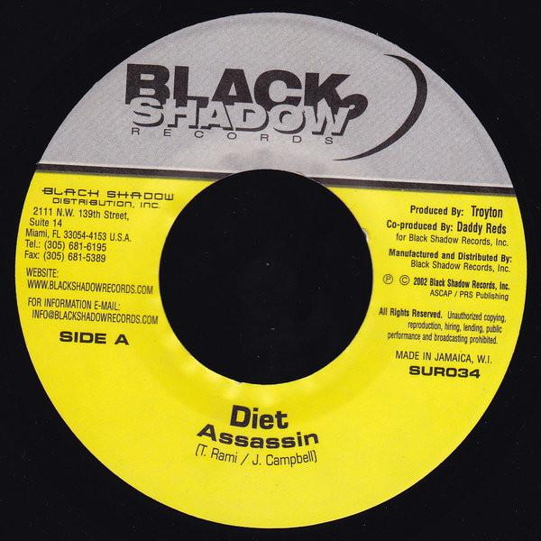 

7-дюймовая пластинка ASSASSIN - Diet SUR034 Black Shadow Re 2002 US Регги, Ска и Даб Б/У