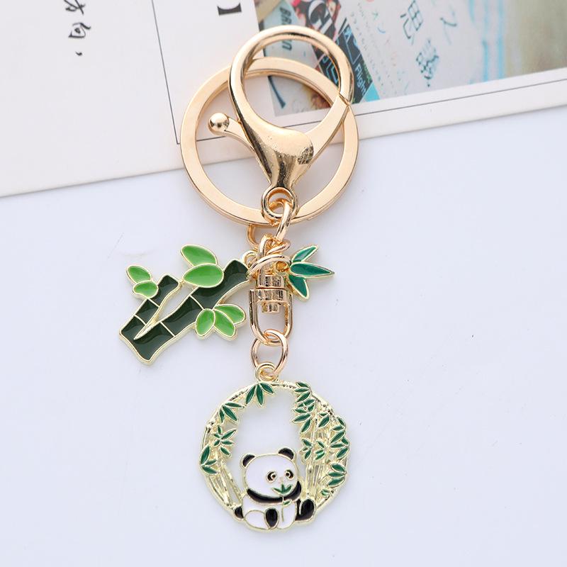 Quirky Cartoon Panda Alloy Keychain Pendant with Cute Bamboo Leaf Design - Earphone Case & Bag Decoration