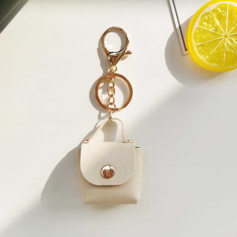 Solid color small bag keychain pendant cross-border same leather mini storage bag cute car bag pendant accessories