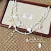 Seaside vacation style pearl shell conch tassel waist chain, casual vacation style, unique belt accessory with a high-end feel