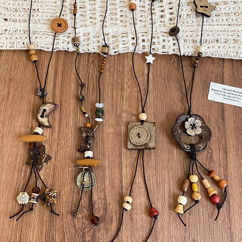 Retro Ethnisch Rund Holz Lang Pullover Halskette Damen Bohemian Blumen Perlen Blatt Quaste Halsketten Tägliches Tragen Schmuck