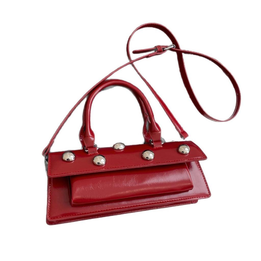 Trendy new products, personalized street style, rivets, portable baguette bags, fashionable Spice Girl style, niche versatile messenger bags, women