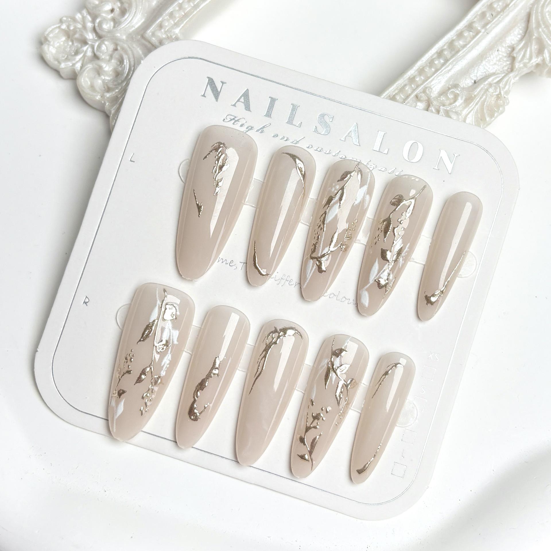 

Gilt 3D Floral Patterned Long Pointed Nail Art Tips - Elegant Whitening, Temperament Style, 10-Piece Set