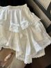 2026 New Irregular White Lace Trim Patchwork Cake Skirt: High Waist, Fluffy, Short Women's Skirt