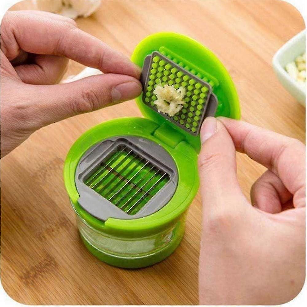 Kitchen Innovations Garlic Press, Crusher, Cutter, Mincer, and Storage Container - Includes Silicone Garlic Peeler - Easy to Clean - Stainless Steel B