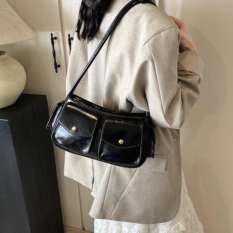 Niche High-end Multi-pocket Locomotive Bag 2025 New Temperament Shoulder Armpit Bag Commuter Messenger Baguette Bag