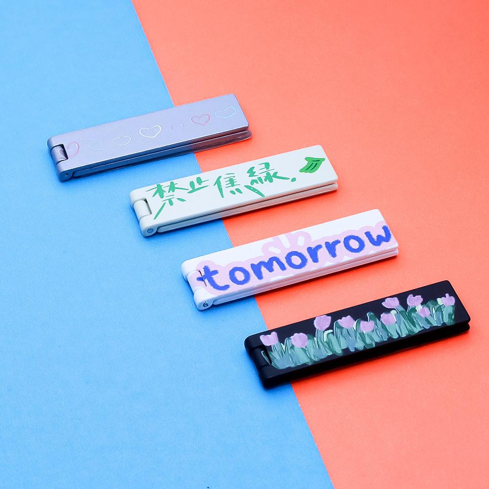 

Desktop bracket Neutral mini one-word bracket Multifunctional card-type long strip flip phone holder