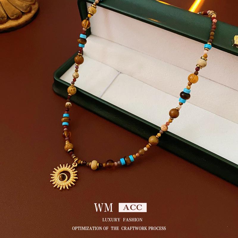 Titanium Steel Sun Necklace with Natural Stone Rice Beads - Retro Ethnic Clavicle Chain, Light Luxury Fashion Accessory