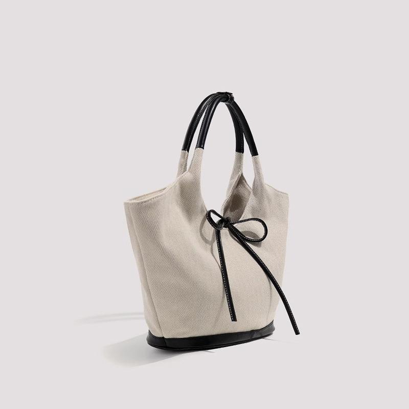 Niche canvas tote bag bow splicing simple commuting shoulder bag casual portable big bag tide