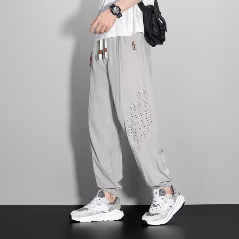 Pánské ležérní kalhoty letní tenké volné velké velikosti 2025 tepláky trendy rychleschnoucí sportovní devítibodové kalhoty ultratenké
