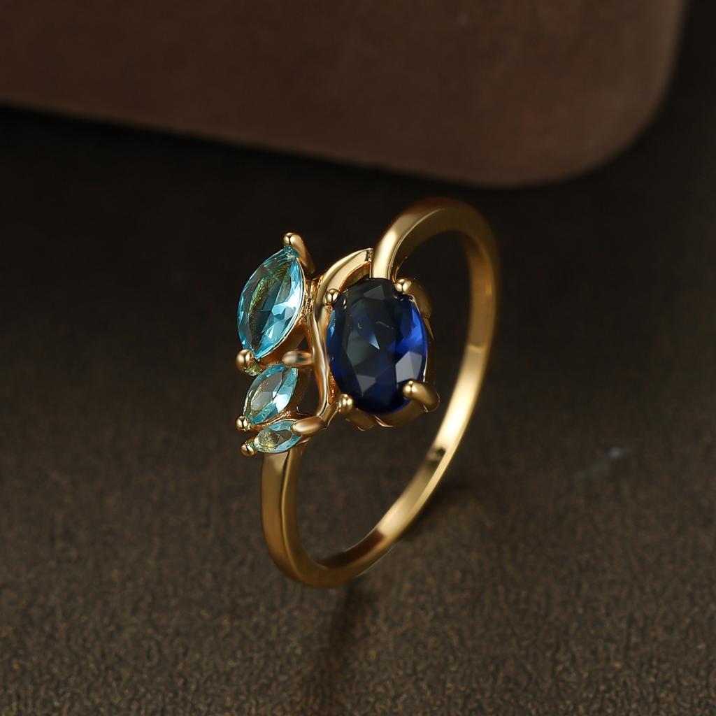 Vintage Two-tone Blue Zircon Ring for Women Gold Branch Horse Eye Light Blue Topaz Ring