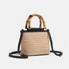 Nischen Design Retro Handgehaltene Strohtasche für Damen Neue Modische Vielseitige Schulter Crossbody Tasche Gewebte Eimer Tasche