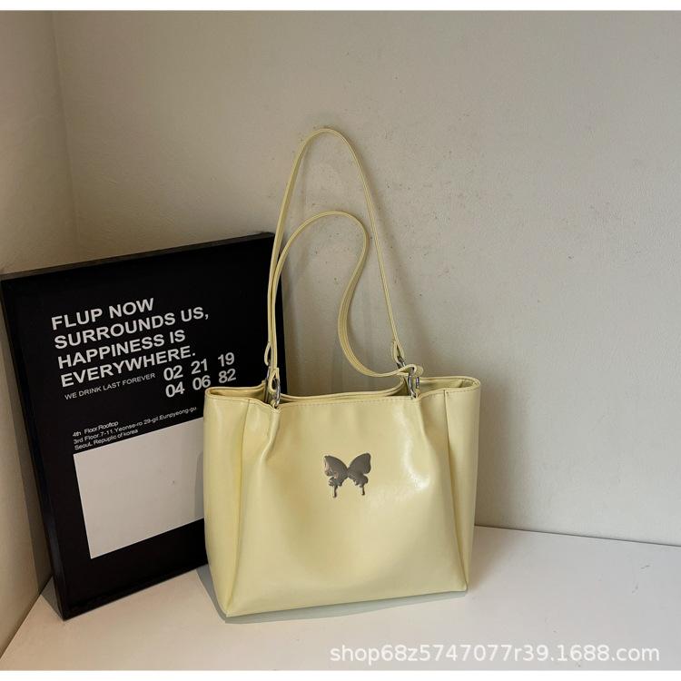 

2025 new large-capacity underarm bag women s fashion and beauty casual butterfly handbag solid color simple tote bag