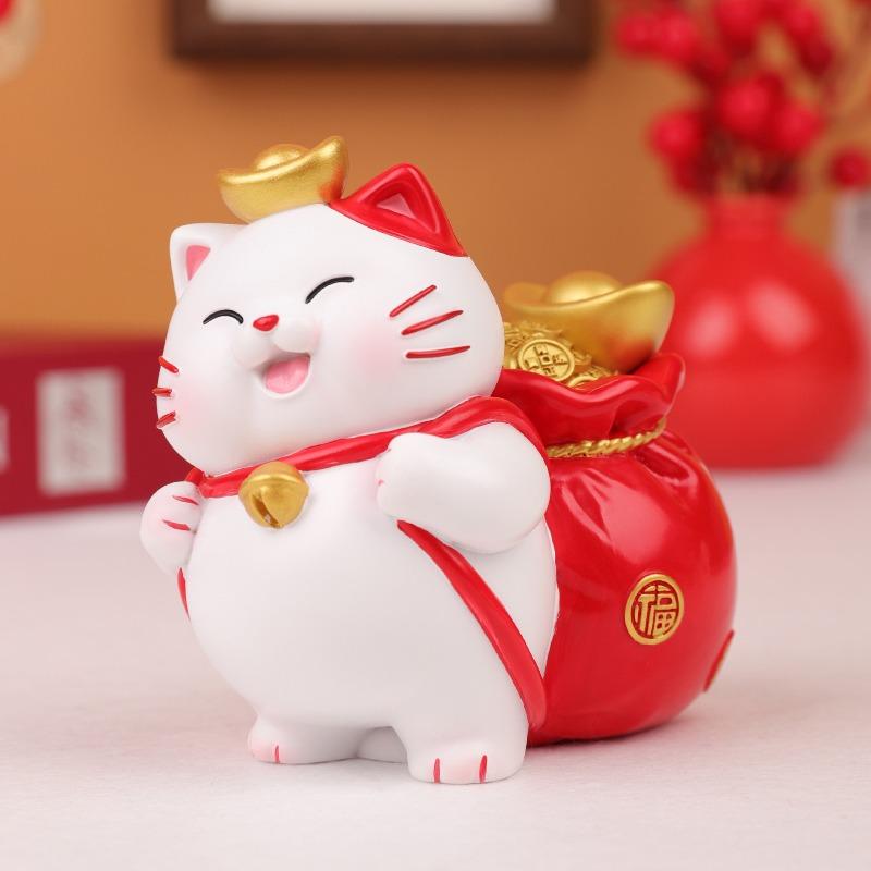 There Are Various Types of Home Decorations Such As The Lucky Cat Ornaments, Festive Tablecloths, and Resin Handicrafts for The Entrance Hall