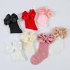 1Set Neugeborenen Big Bowknot Stirnbänder Aushöhlen Lange Socken Neue Baby Weiche Feste Prewalker Socke Mädchen Infant Gestrickte Haarband Socken
