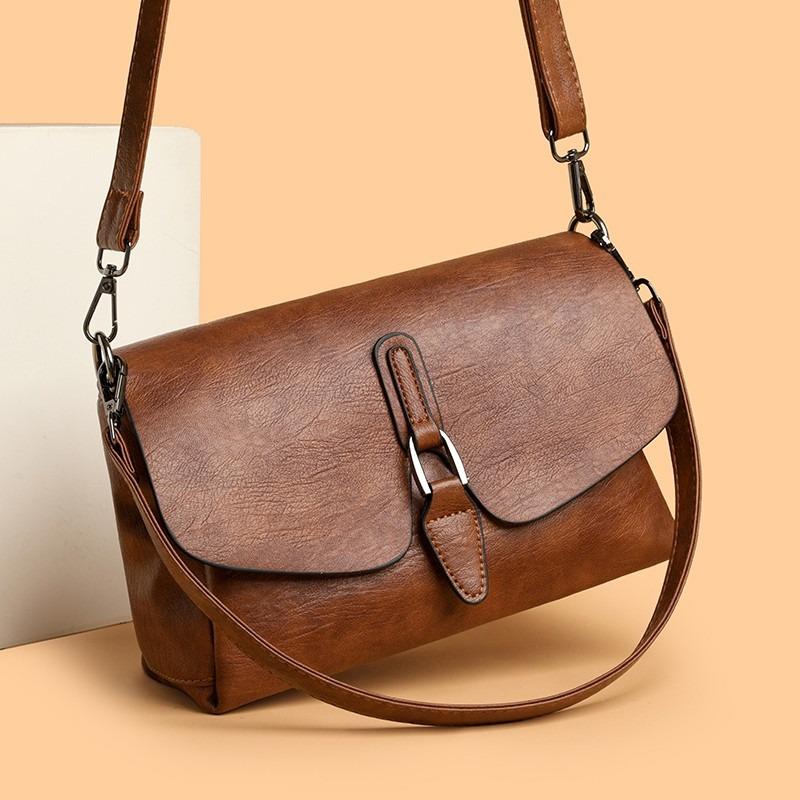 Damen Umhängetasche mit Klappe aus strukturiertem Leder Lässige Schultertasche