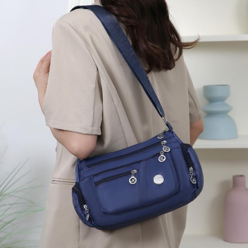 Bag Women's Large Capacity Shoulder Bag Waterproof and Wear Resistant Multi Pocket Commuter Leisure Outdoor Crossbody Bag