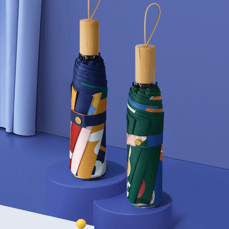 Three-fold hand-opened fashionable simple weather and rain parasol folding dual-purpose cartoon vinyl sunscreen umbrella