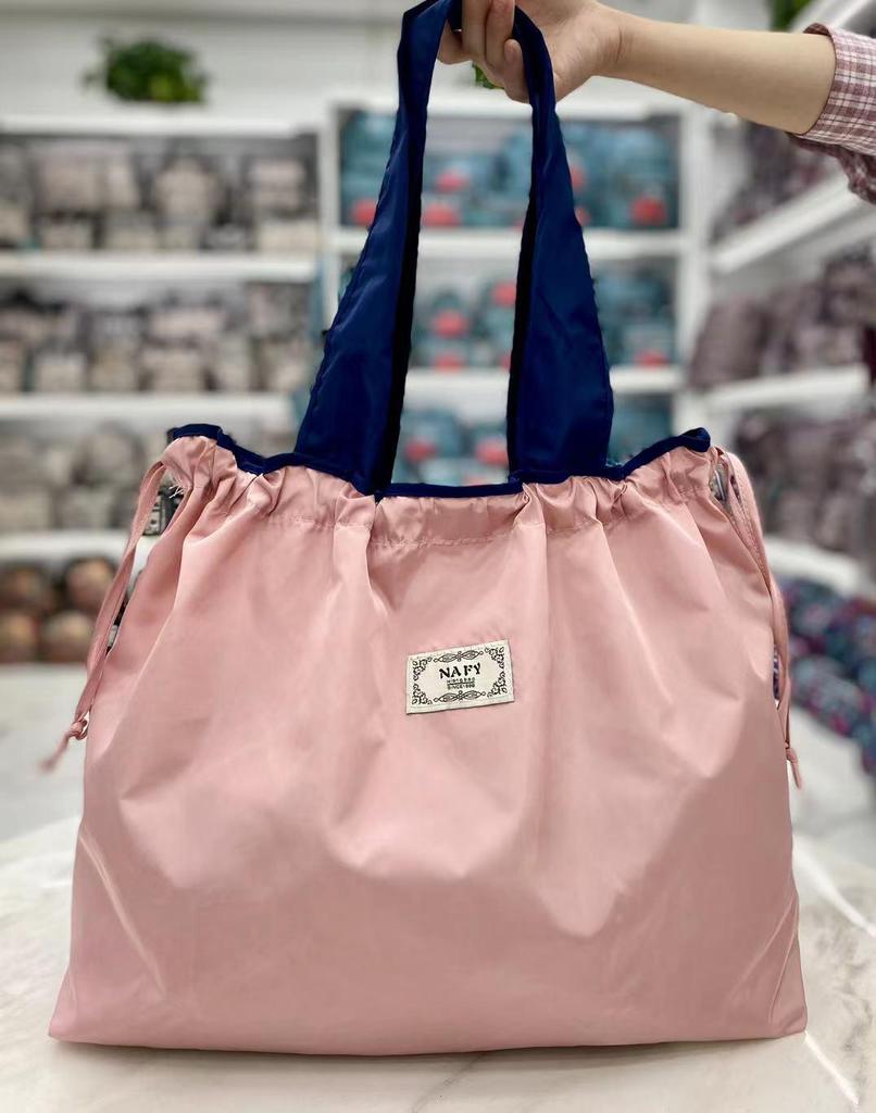 Eco-friendly Lightweight Water-repellent Foldable Shopping Bag with Drawstring Closure and Large Capacity