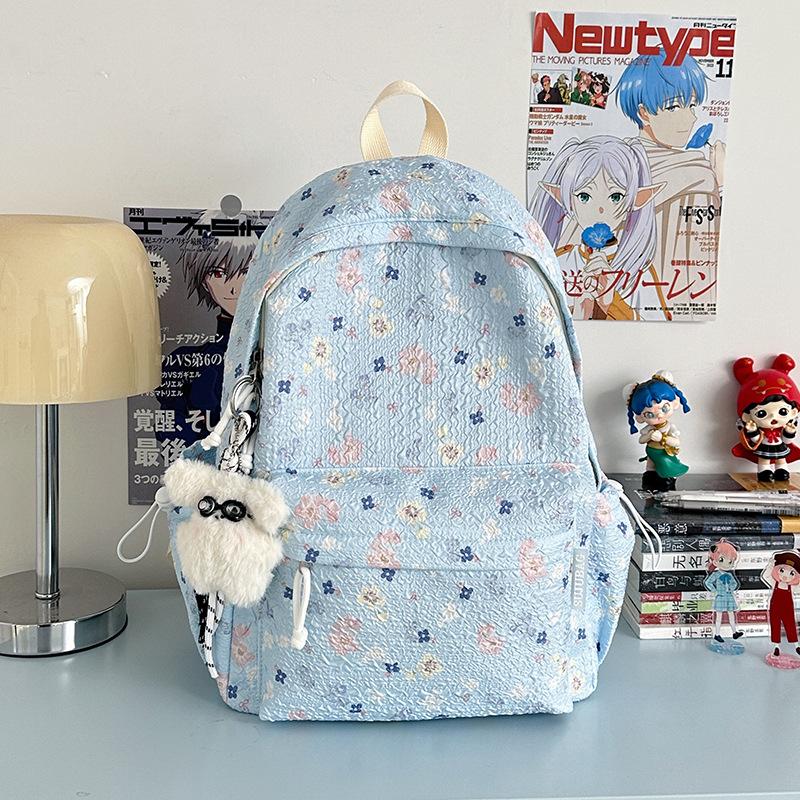 Korean ins cute little floral high-value schoolbag junior high school girls large-capacity backpack high school students casual shoulders