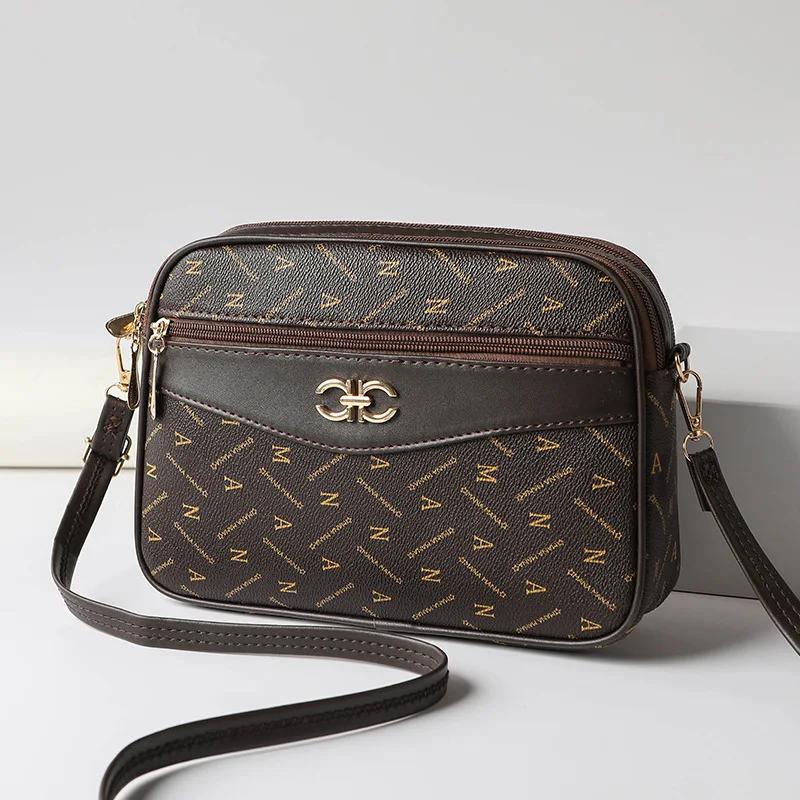 Malá messenger kabelka Nová velkokapacitní dámská diagonální crossbody značková taška pro maminky Středního věku Čtyřvrstvá taška na mobilní telefon